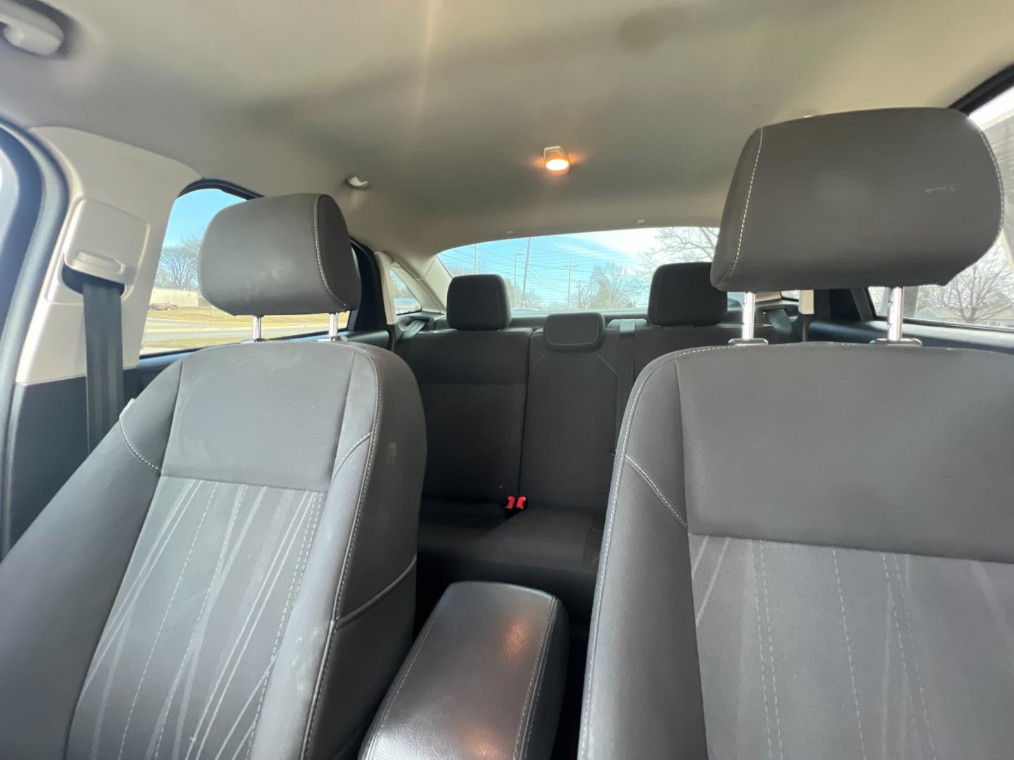 2018 Shadow Black Ford Focus SE Sedan (1FADP3FE7JL) with an 1.0L L3 engine, located at 1633 W Kimberly, Davenport, IA, 52806, (563) 323-5341, 41.559456, -90.598732 - Photo#9